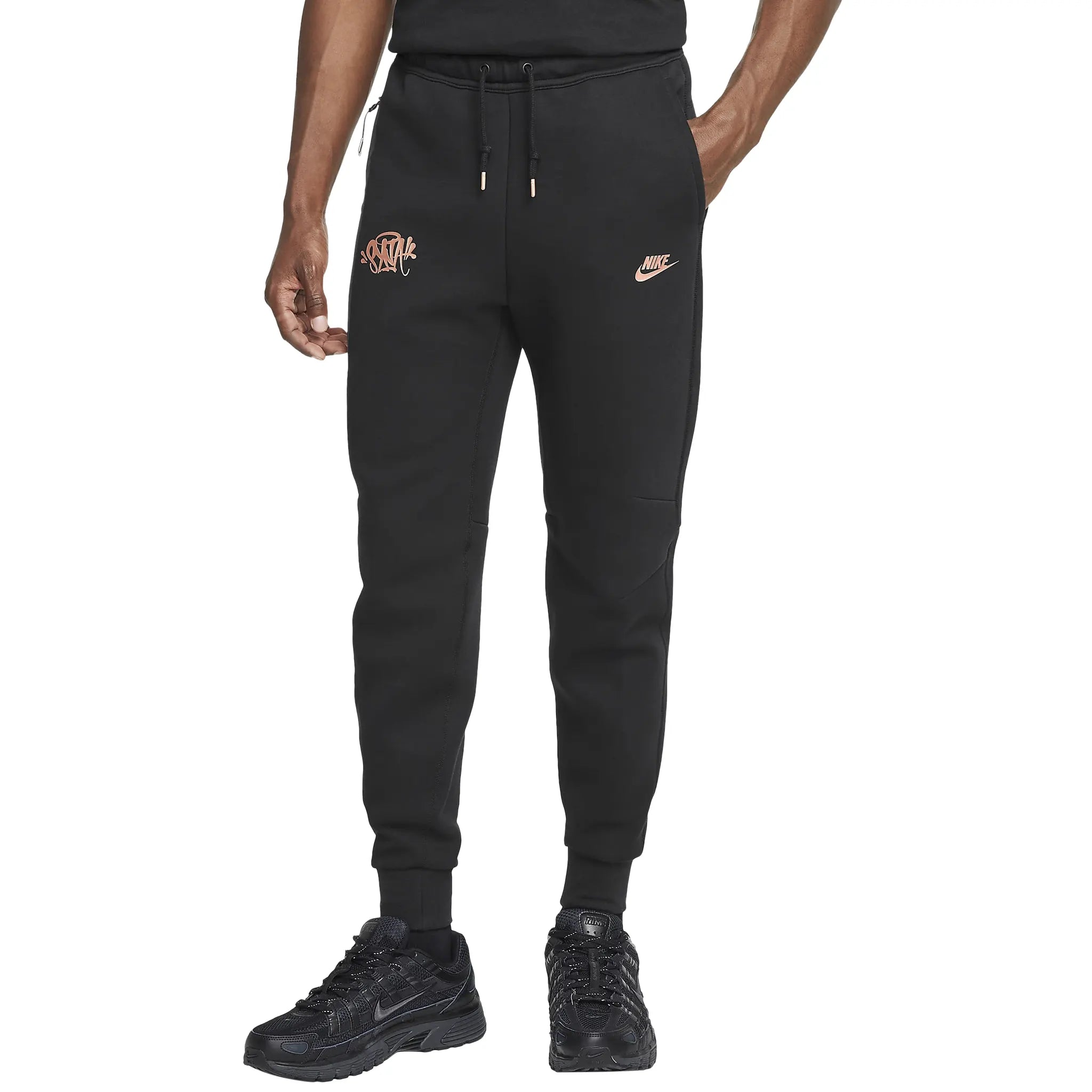 Model front pants view of Syna World x Nike Central Cee Tech Fleece Black Tracksuit HQ3748-010 | HQ3749-010